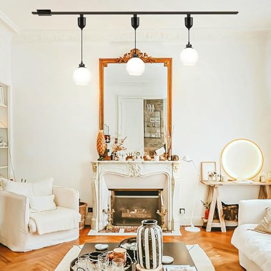 Kiven J-Type track lighting pendant with frosted glass shades, installed over a living room, black finish track