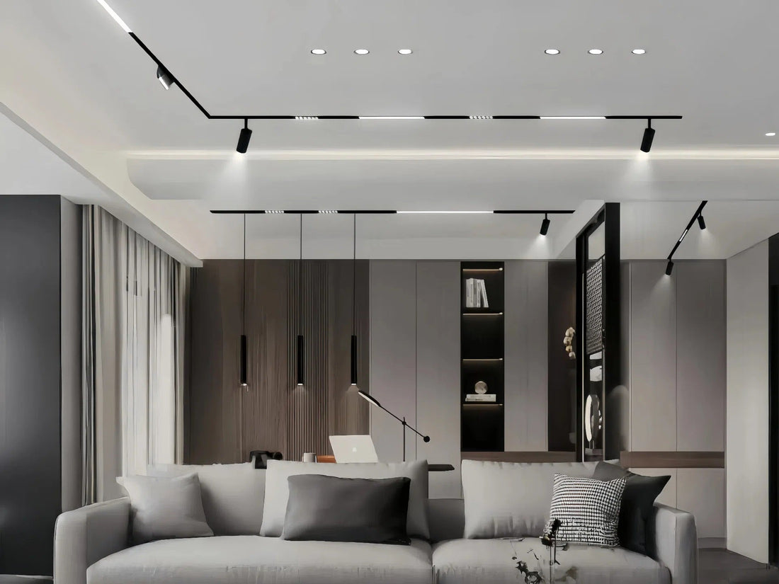 A modern, minimalist living room with a sleek track lighting system and built-in storage showcasing a cozy seating area.