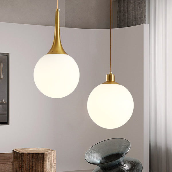 Nordic Gold and Milk White Glass Globe Pendant Lights. Modern lighting for dining & bar, featuring the Trumpet style.