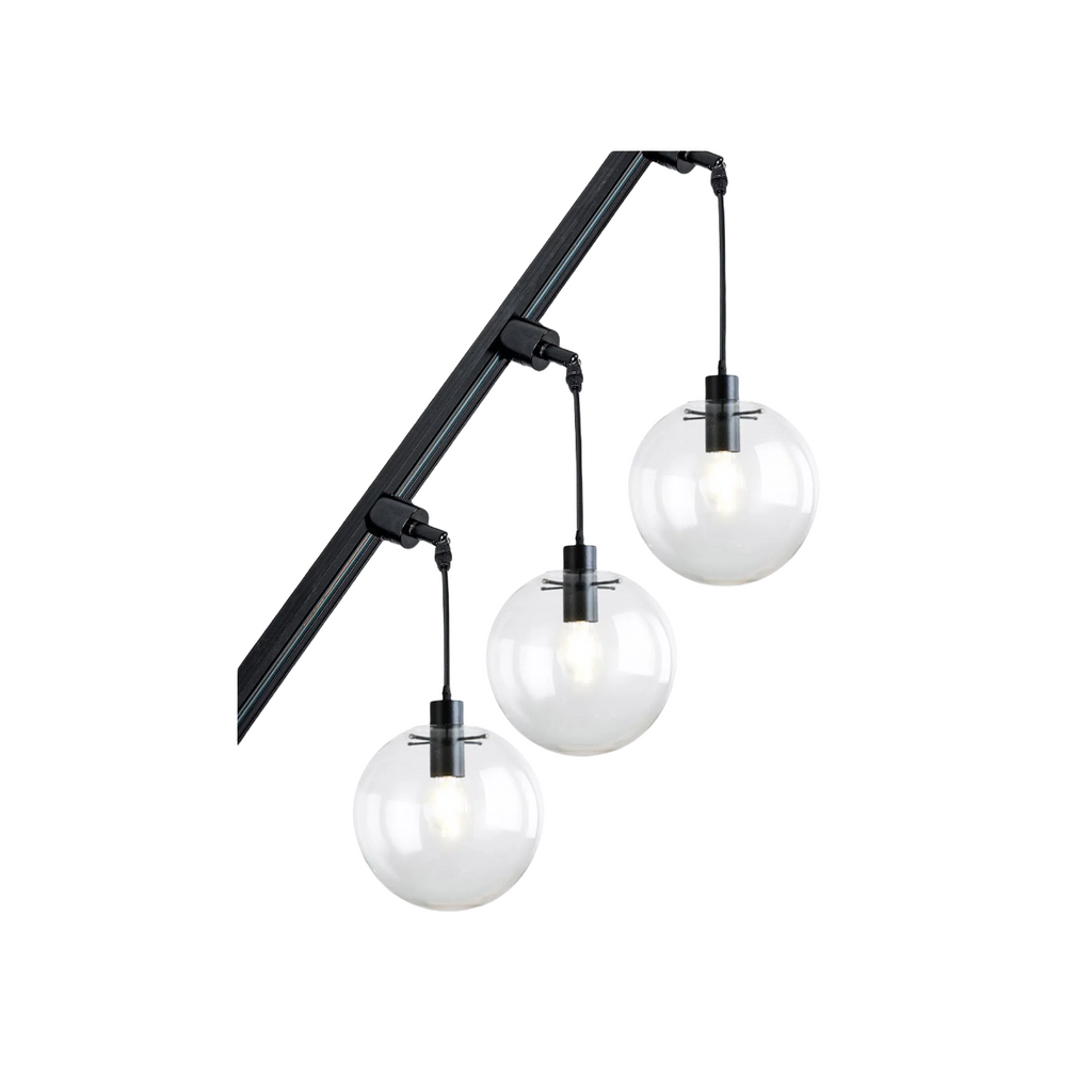 Modern sloped track light fixture with three glass globe shades, perfect for inclined roofs.