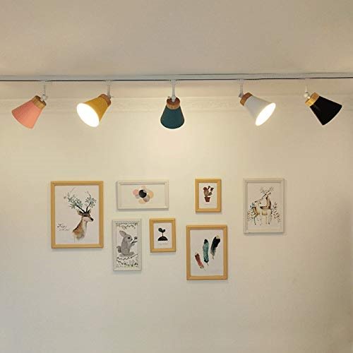 Colorful modern track pendant lights with framed wall art, ideal for kitchen, bedroom, or dining room.
