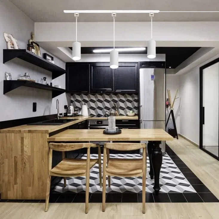 White LED track pendant lights with adjustable brightness and color in modern kitchen setting. Kiven Lighting.