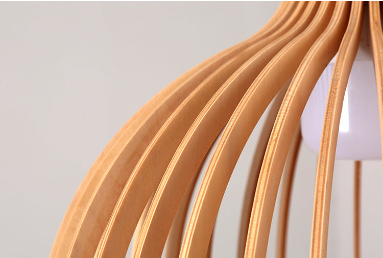 Minimalist wooden pendant light with wood shade, highlighting the warm-toned wood and LED bulb for stylish lighting.
