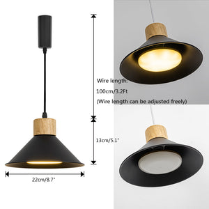 Black metal and wood pendant light with adjustable wire, perfect for dining room lighting