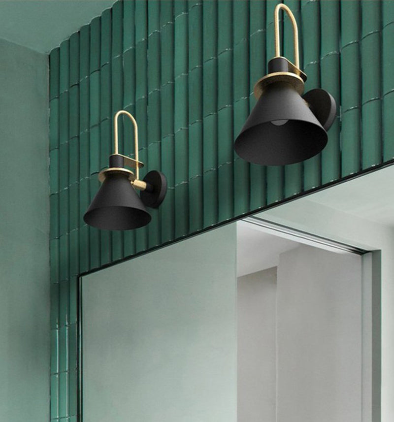 Black and gold gooseneck wall sconce, battery operated and dimmable, for modern home lighting.