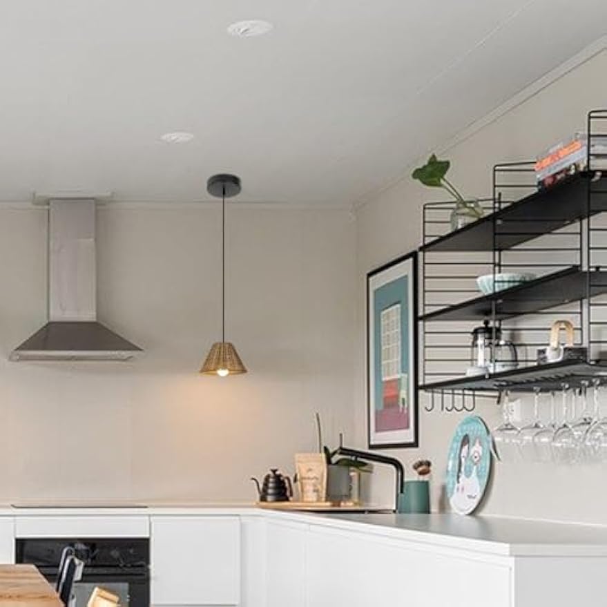 Rattan farmhouse pendant light over kitchen island with E26 adapter for recessed lighting conversion, farmhouse style.