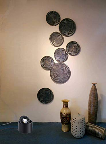 Black 5W LED Barrel Spotlight accent lighting showcasing wall art. Adjustable spotlight with 5.9ft foot pedal switch cord.