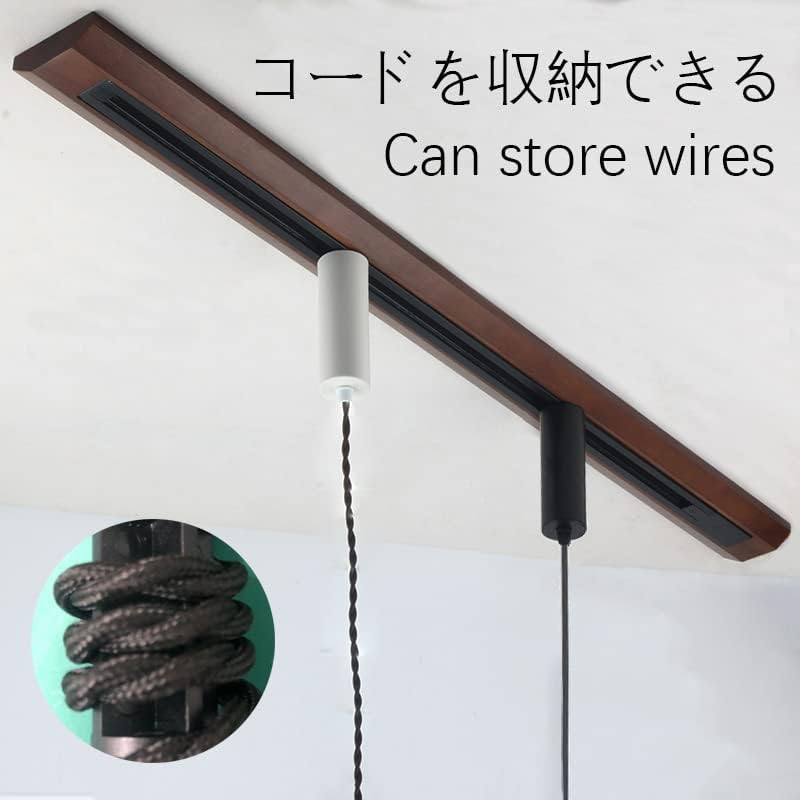 Retractable track lighting pendant showing wire storage, wooden track with white and black pendant lights.