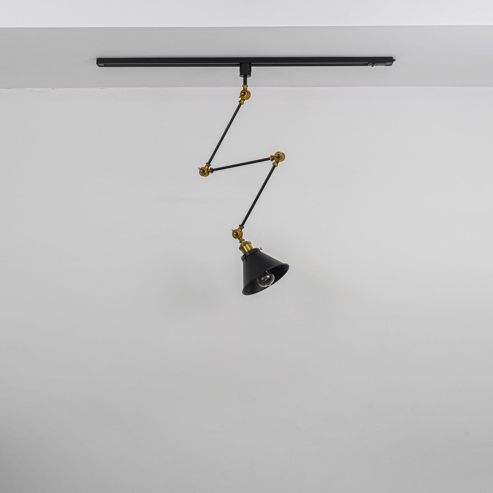 Black and gold bronze adjustable track lamp. Vintage design, flexible arm for directional lighting, E26 bulb.