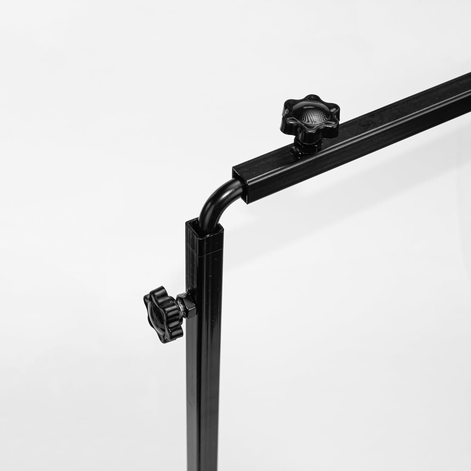 Black adjustable plant grow light stand with adjustable height, featuring star knobs for easy height adjustments.