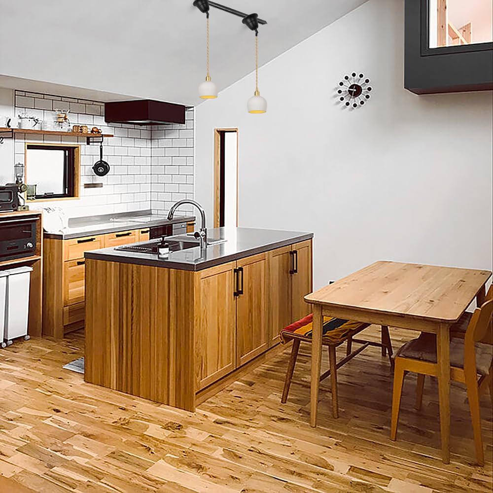 Adjustable white ceramic pendant lights in kitchen, suitable for sloped position track lighting, featuring adjustable cord.