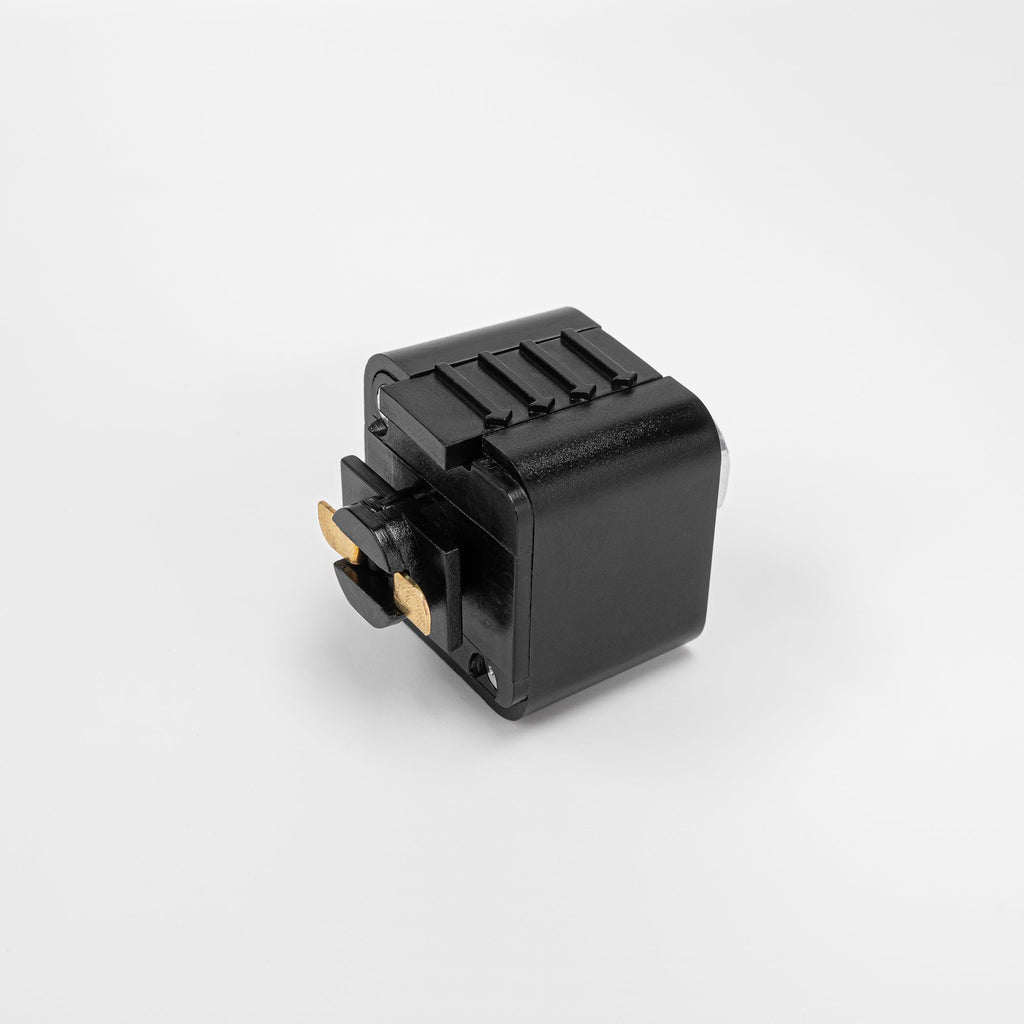 Black Lightolier track adapter fitting for L system track lighting, ideal for stage lighting.