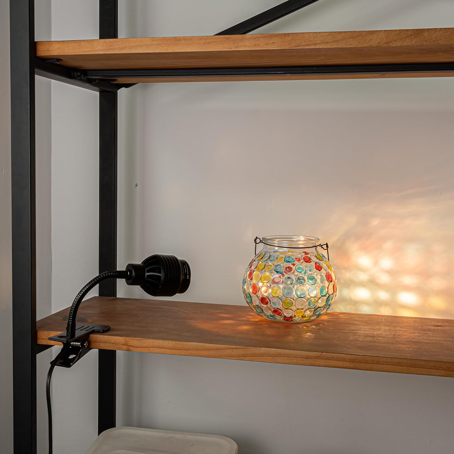 Clip mount full spectrum spotlight with glass jar, adjustable angle lighting for decoration and plant growth. Black finish.