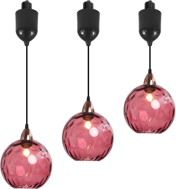 Three pink hammered glass Juno track pendants with adjustable height for kitchen or bar lighting, vintage style, E26 socket.