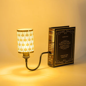 Kiven Bookcase Lamp, book-shaped design, patterned lampshade, for bookshelf decor, "SAMPLE TEXT" detail.