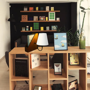 Kiven Cordless Bookshelf Lamp on wooden bookshelf with decorative books and items, creating modern decor