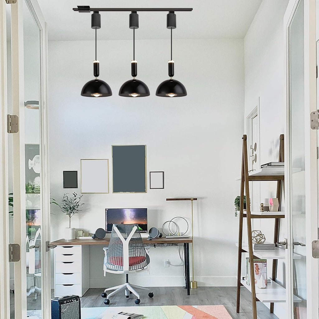 Modern black track pendant lights with adjustable length above a home office desk. Perfect for kitchen island lighting.