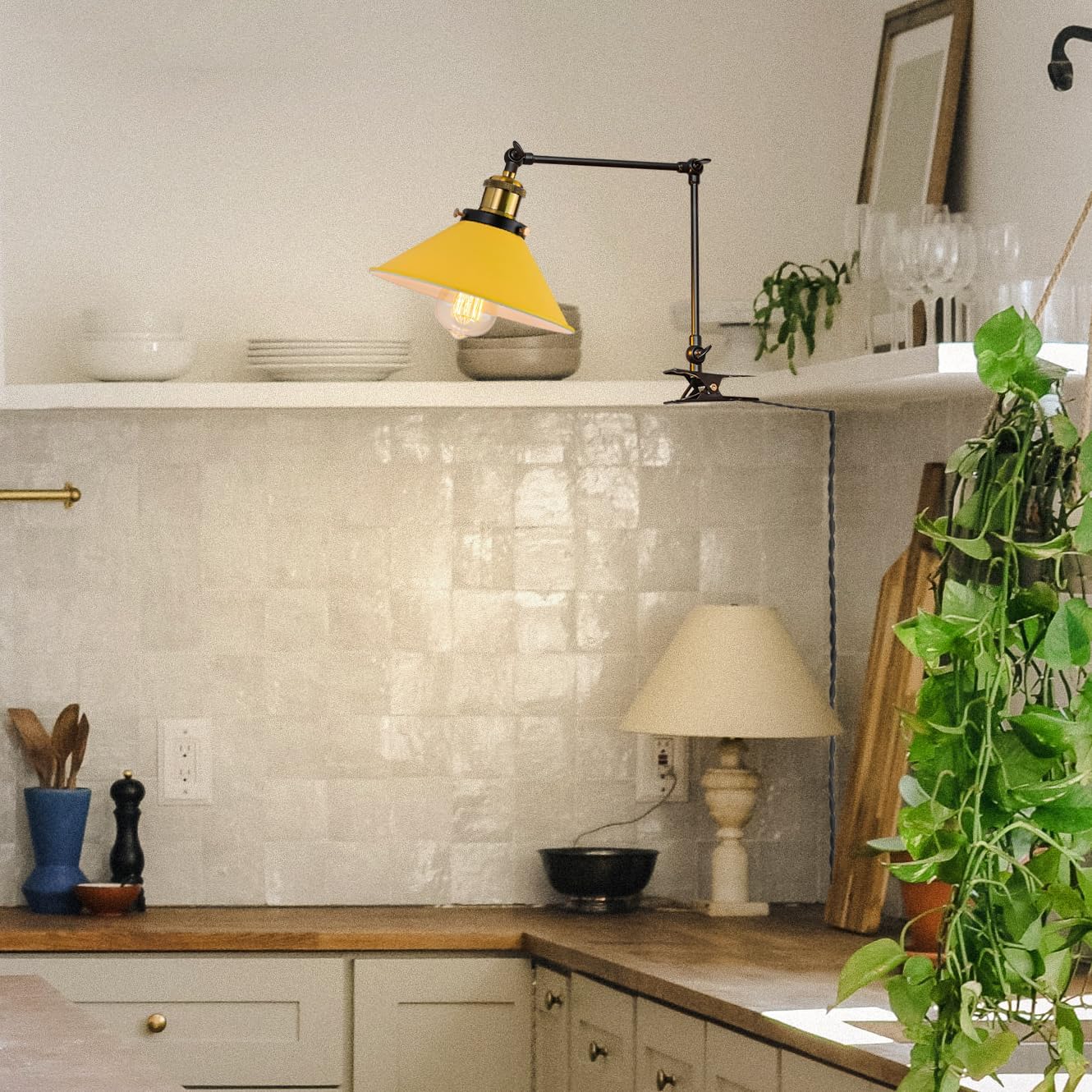 Yellow clip-on desk lamp on shelf, flexible arm for bookshelf or bedside lighting, modern design with vintage touches.