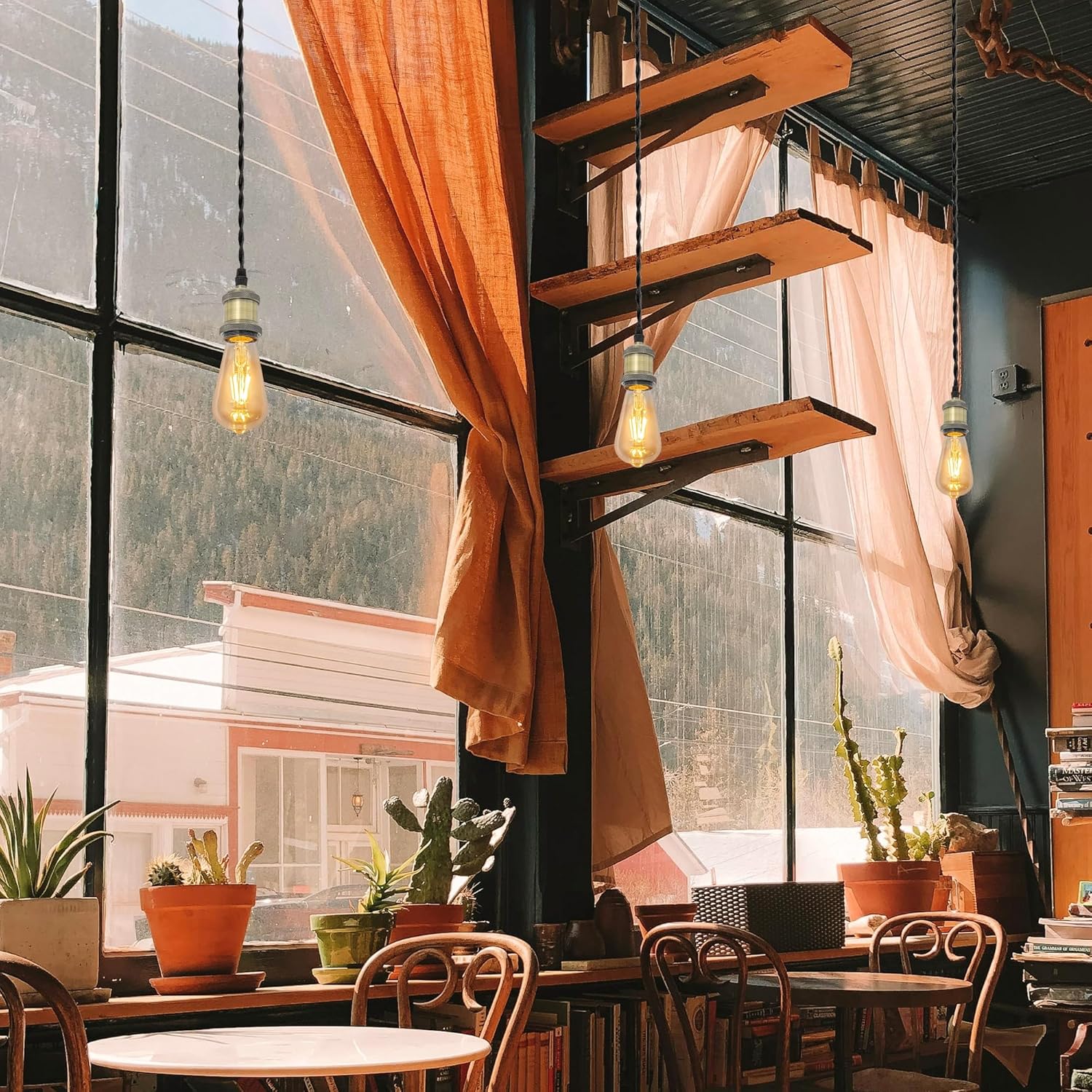 Kiven H-Type track pendant lighting with bronze finish, Edison bulb, and industrial design, showcased in a cafe setting.