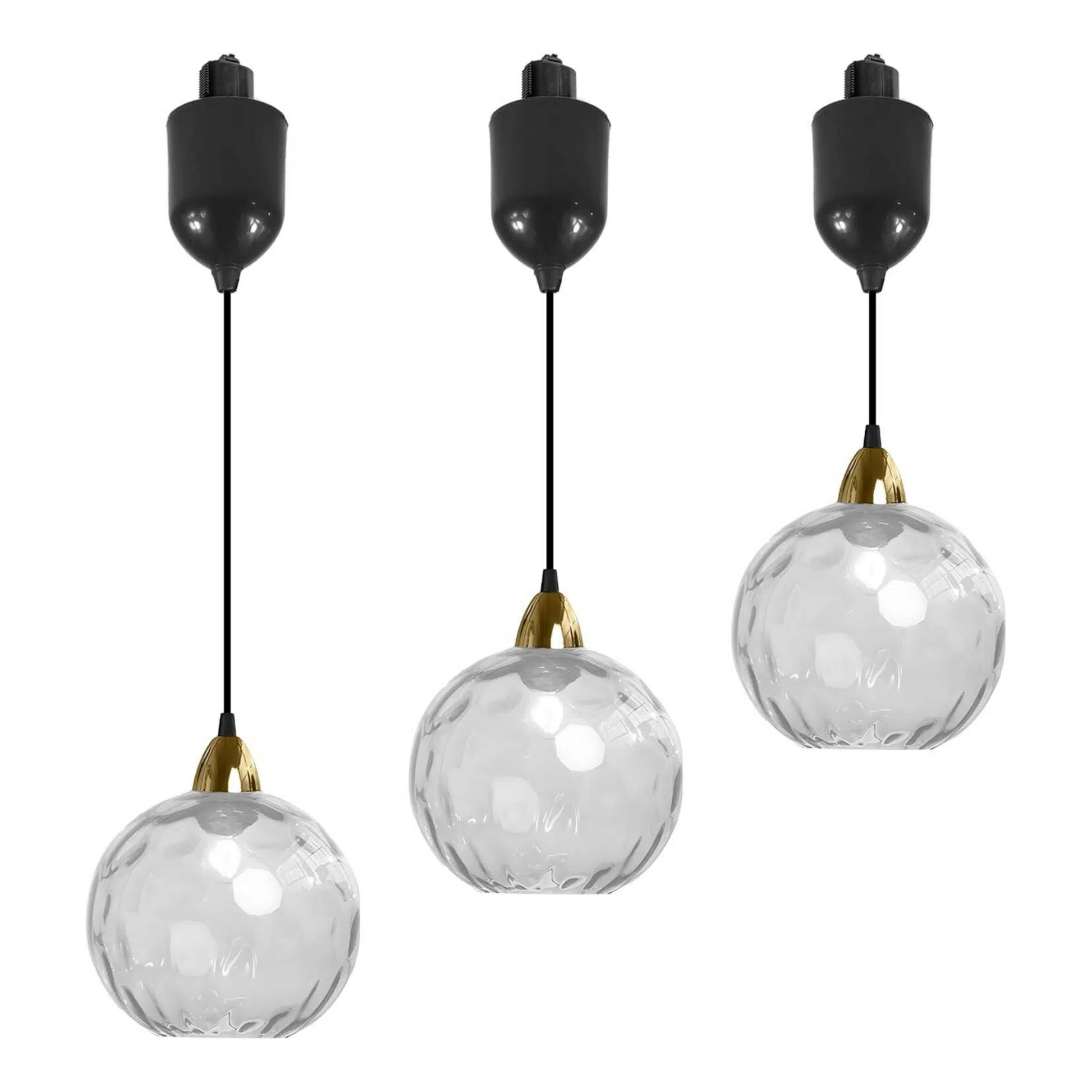 Three clear hammered glass Juno track pendants with black cord and adjustable height, ideal for kitchen or bar lighting.