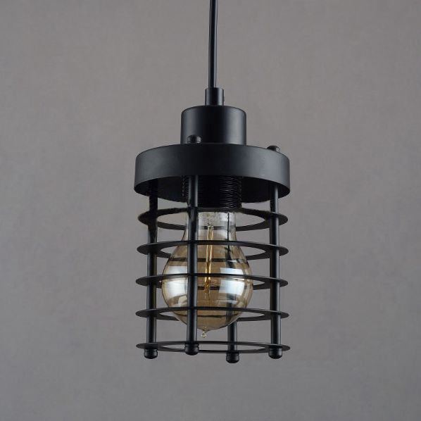 Black iron cage track light pendant with Edison bulb. Vintage industrial lighting fixture for stylish home decor.