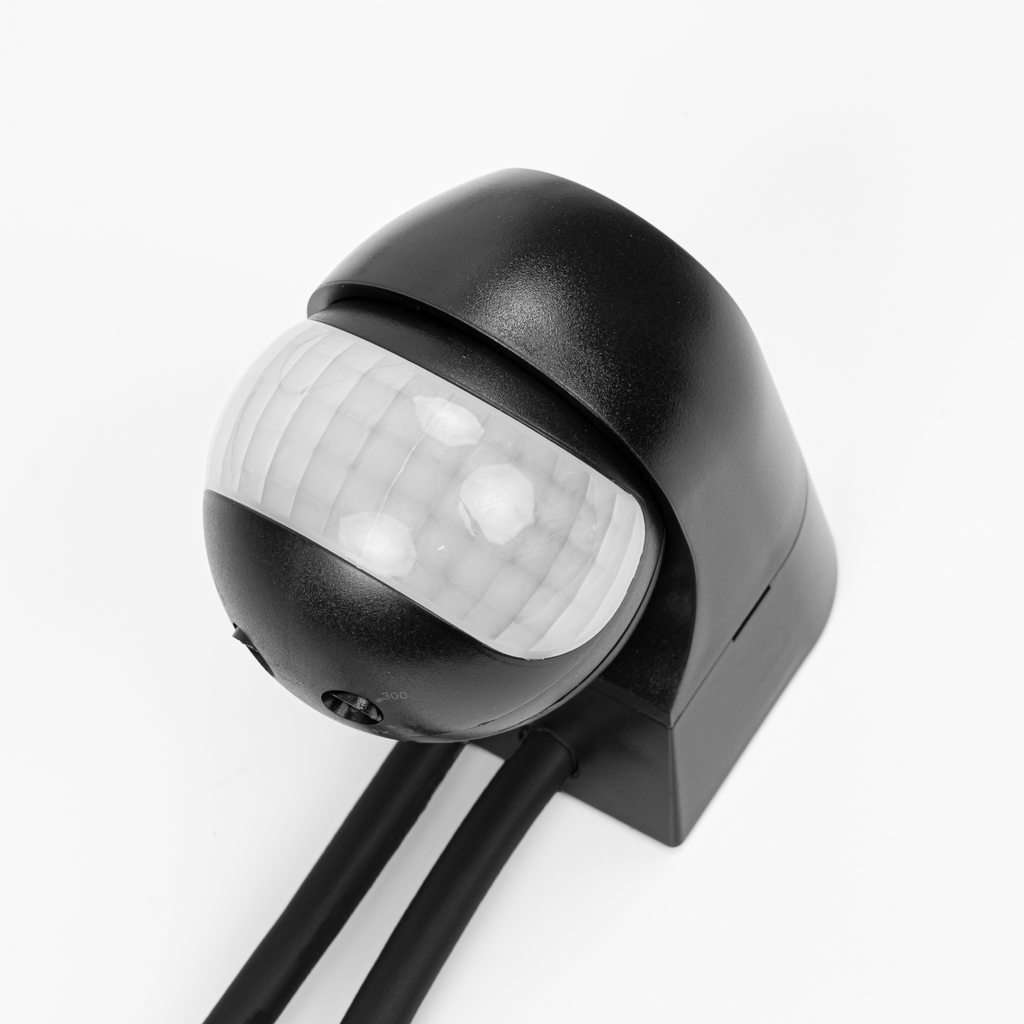 Black weather-resistant 180-degree infrared motion detector sensor head for outdoor lighting