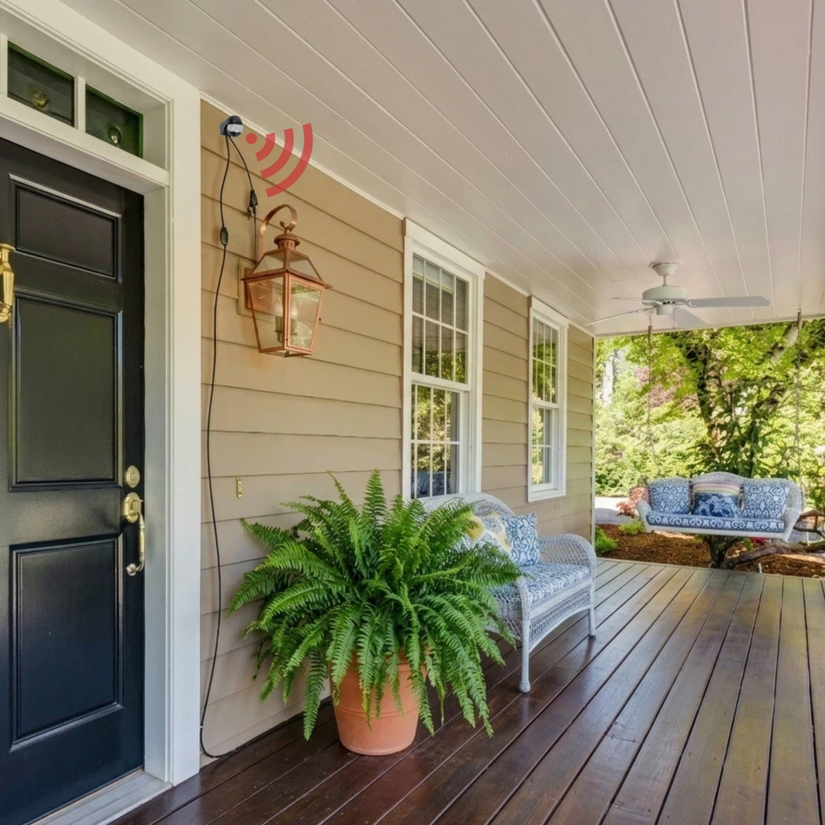 IP44 waterproof plug-in motion sensor light installed on front porch entryway wall for rental home security
