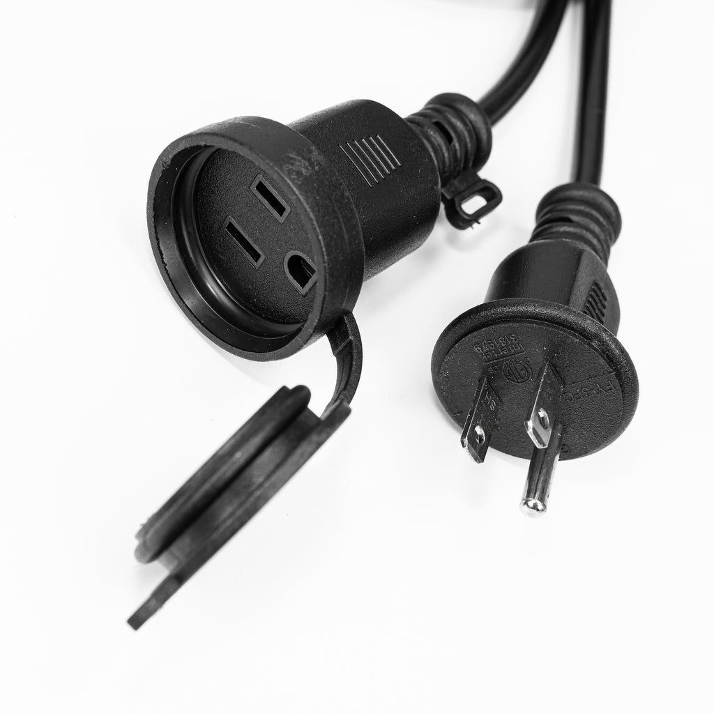 Close-up of the US 3-prong grounded plug and waterproof female outlet with protective cover. Designed for safe outdoor use with heavy-duty weather-resistant power cords for motion-activated lighting.
