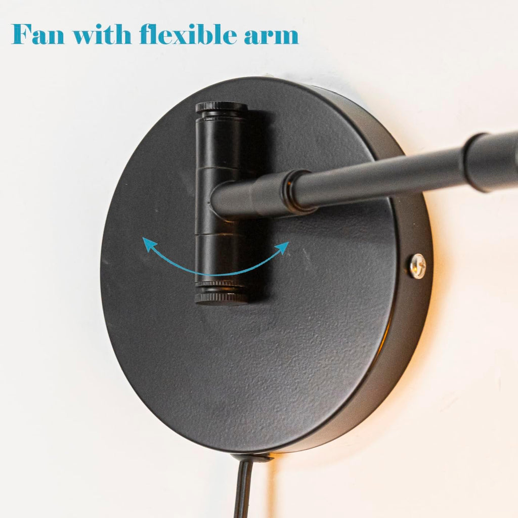 Close-up of industrial black wall mount fan base with flexible swiveling joint and arm