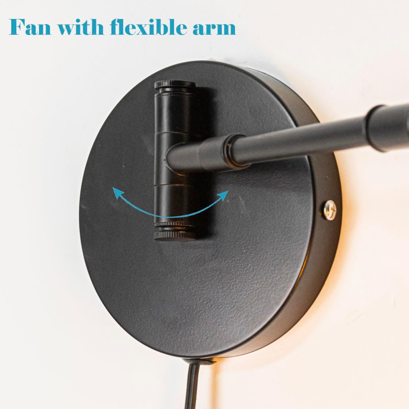 Close-up of industrial black wall mount fan base with flexible swiveling joint and arm