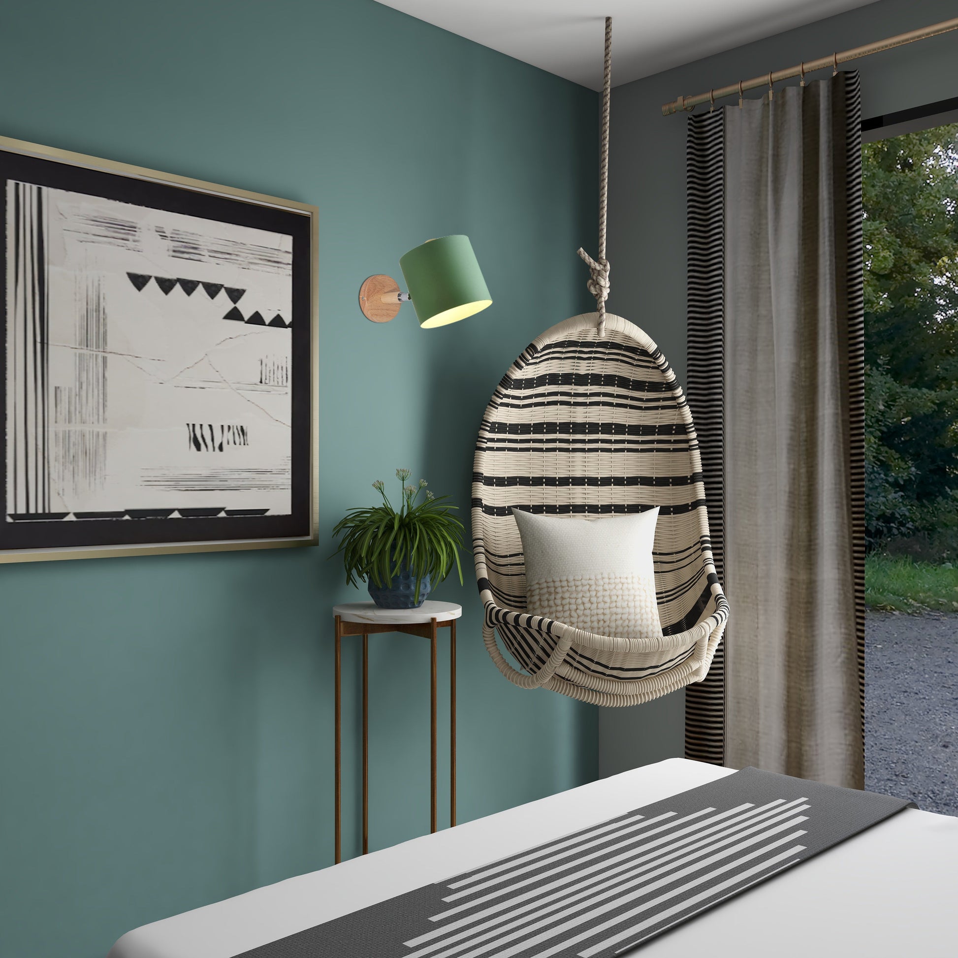 Modern bedroom interior with Kiven Lighting wall sconce, green cylinder shade, wood base. A hanging chair, and stylish decor.