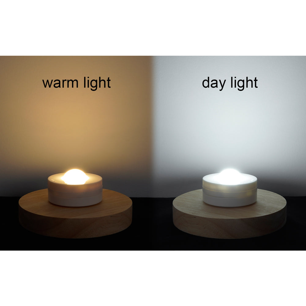 Dimmable LED night light showcasing warm and day light options, cordless and battery-operated, ideal for ambiance and decor.