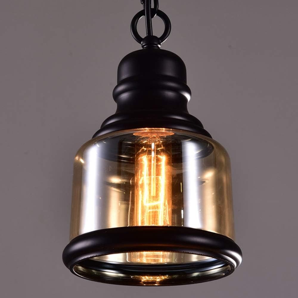 Dimmable amber glass pendant light, industrial vintage style. Black metal accents, perfect for kitchen, dining room.