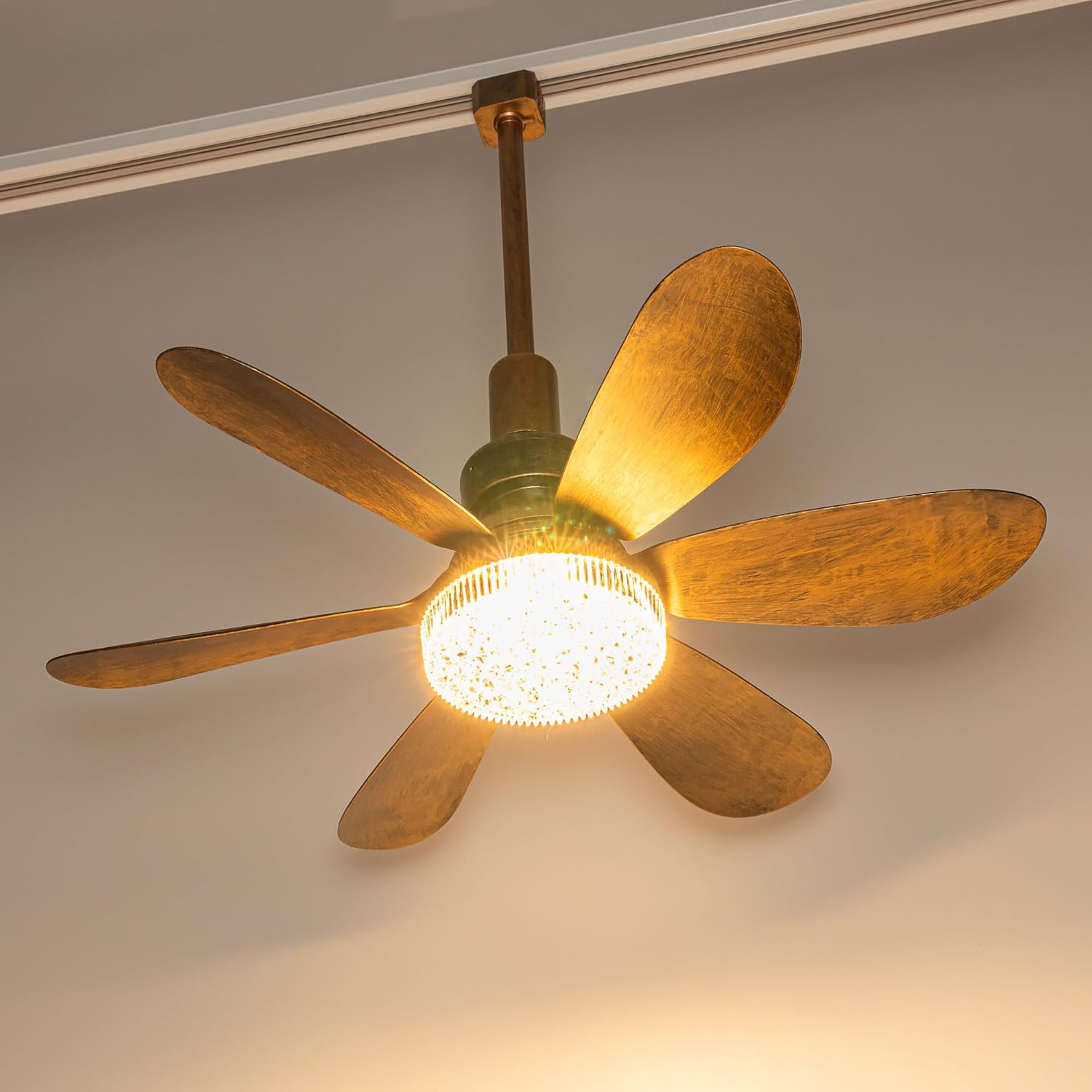 A retro-style small track ceiling fan in antique bronze finish, featuring 6 blades and a crystal LED light cover, shown installed on a standard ceiling track lighting rail system.
