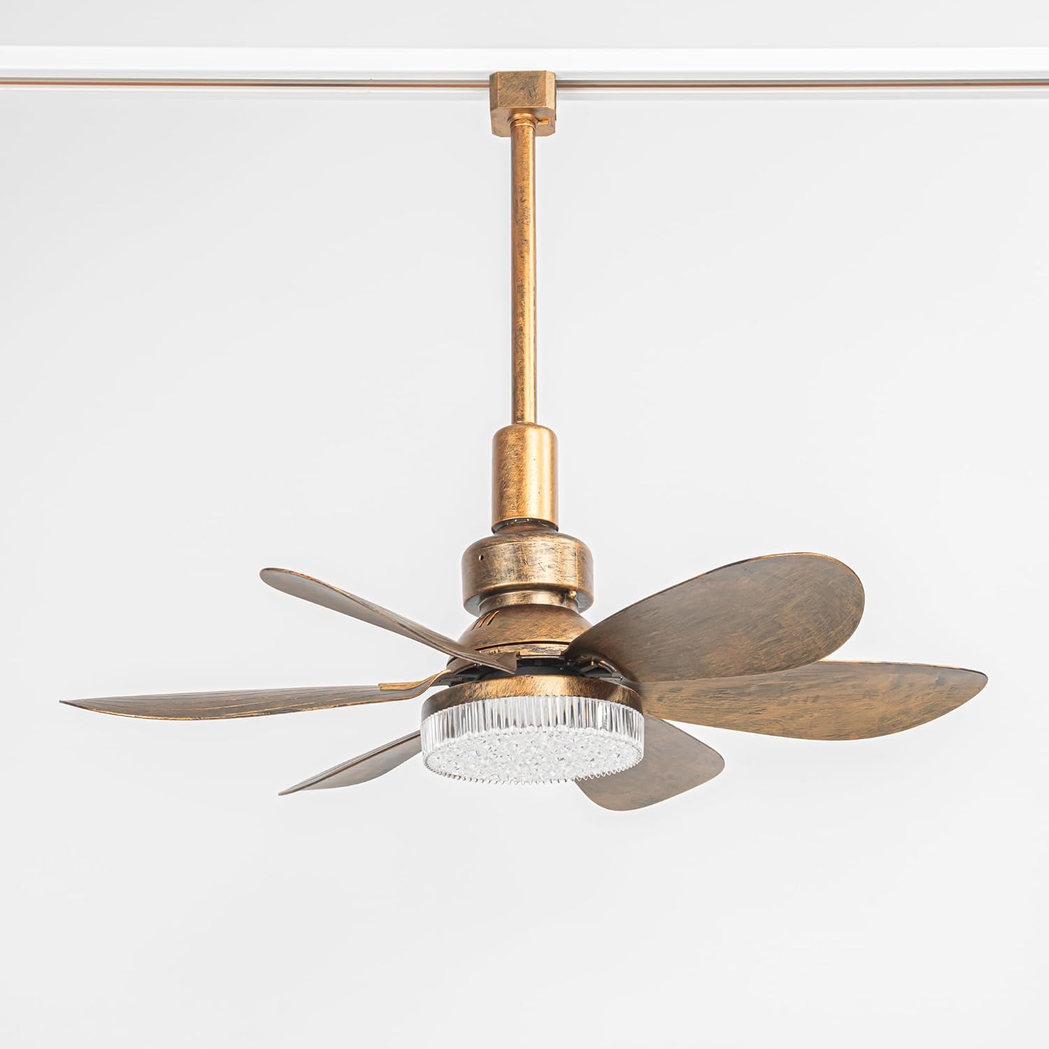 Close-up of a vintage bronze track ceiling fan showing the connector mounted on a white track rail. This 12W mini fan uses a standard H Type Track for easy plug-and-play installation in home or office track lighting systems.